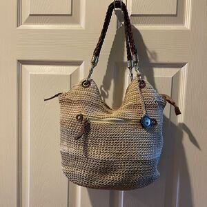The SAK Crochet Sand,gray &khaki bucket style shoulder bag braided brown straps